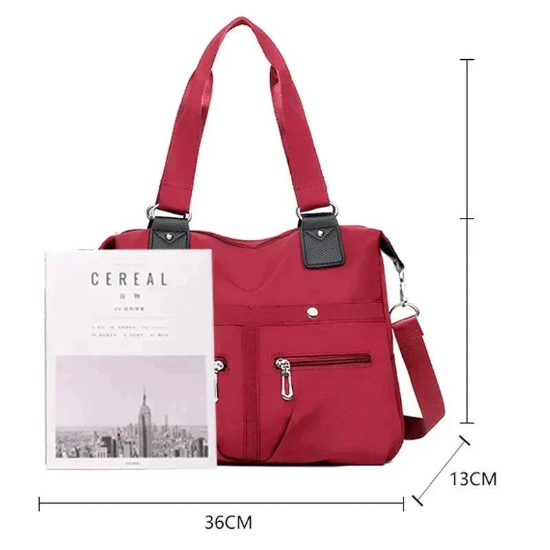 (Compre 1 Leve 2) Bolsa Feminina Impermeável Myla + Brinde Exclusivo!