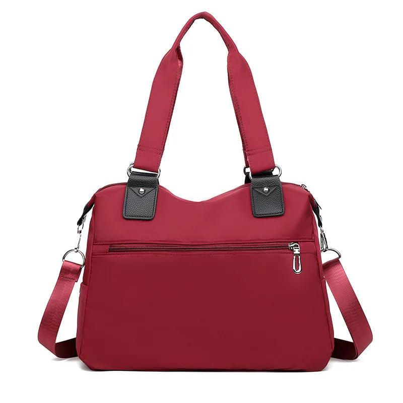 (Compre 1 Leve 2) Bolsa Feminina Impermeável Myla + Brinde Exclusivo!