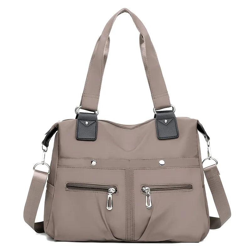 (Compre 1 Leve 2) Bolsa Feminina Impermeável Myla + Brinde Exclusivo!