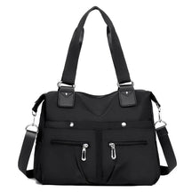 (Compre 1 Leve 2) Bolsa Feminina Impermeável Myla + Brinde Exclusivo!