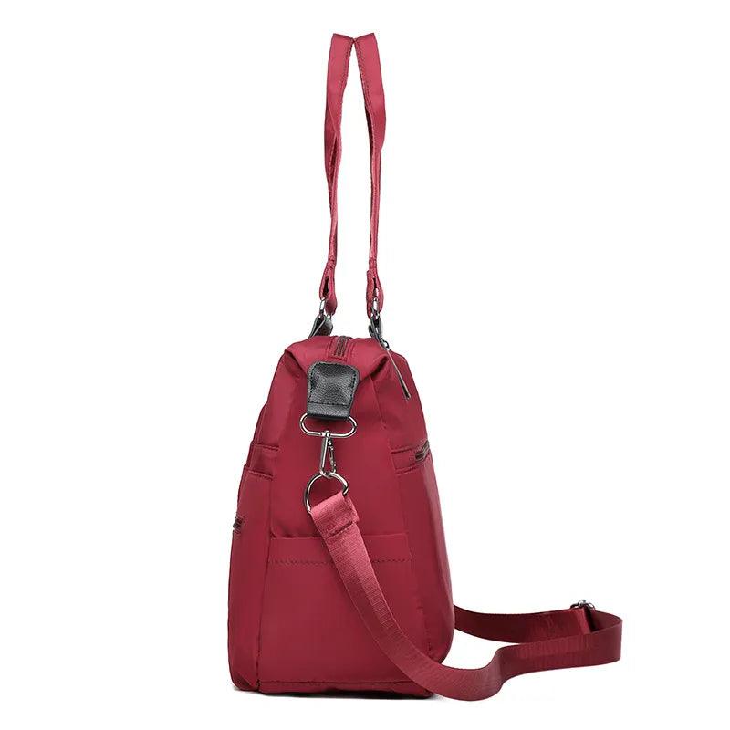 (Compre 1 Leve 2) Bolsa Feminina Impermeável Myla + Brinde Exclusivo!