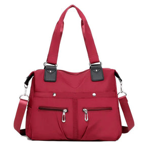 (Compre 1 Leve 2) Bolsa Feminina Impermeável Myla + Brinde Exclusivo!